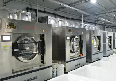 開一家酒店布草洗滌廠的投資與設備指南——洗衣廠必備洗滌機械解析